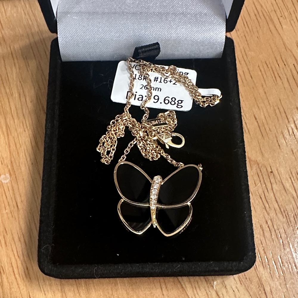 Elegant Black and Gold Butterfly Necklace